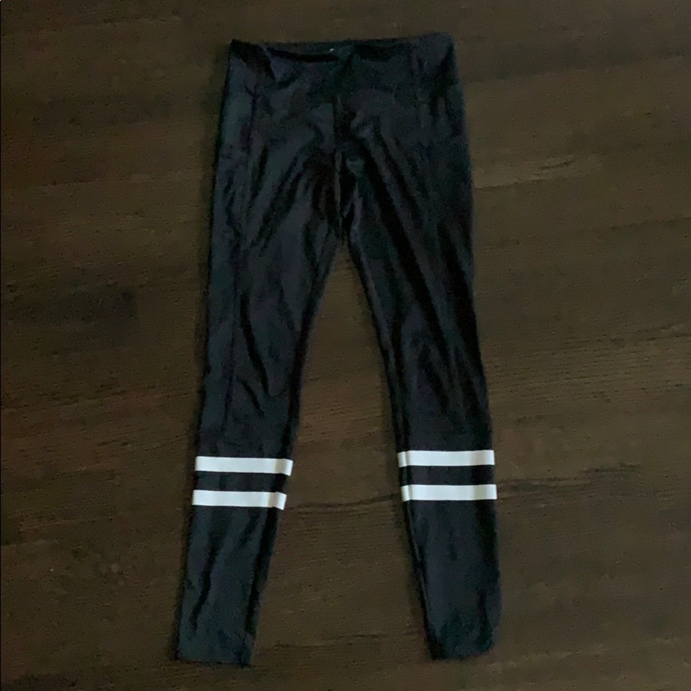 Black leggings with white stripes